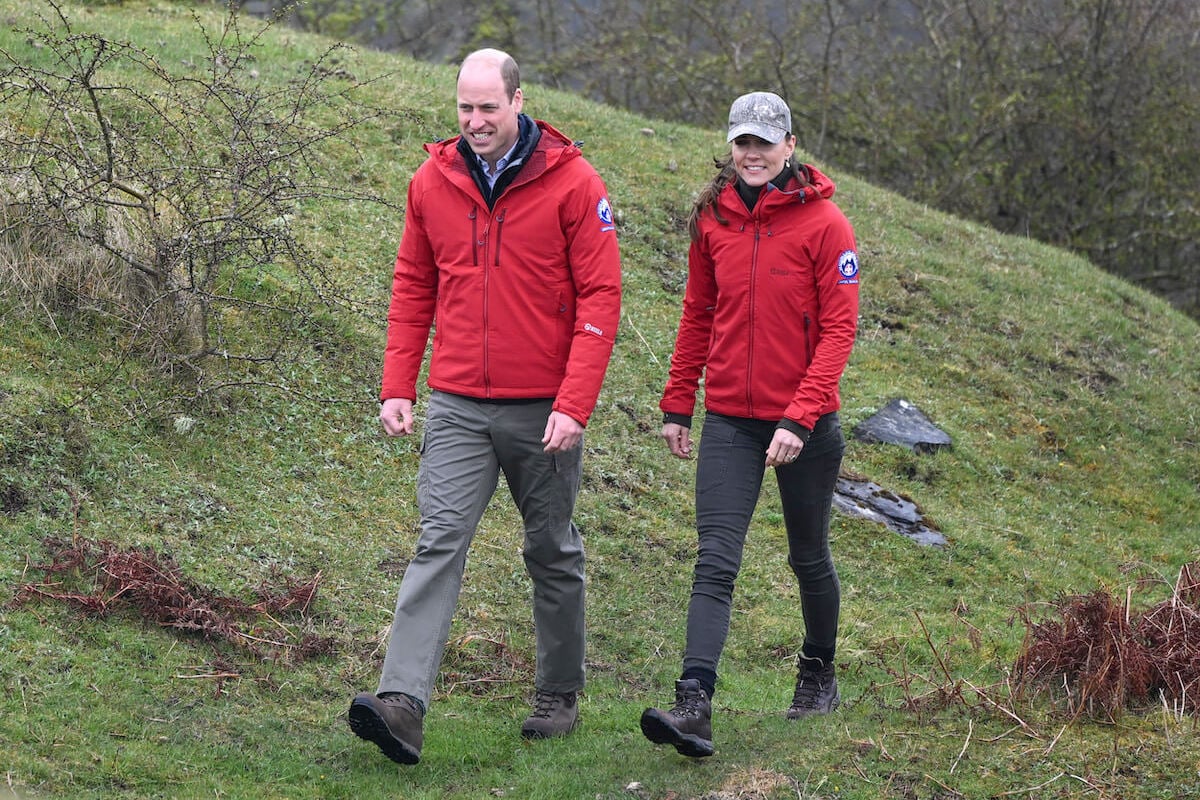 Prince William, whose decision to stay in a Wales bed and breakfast pointed to his future as king, walks with Kate Middleton