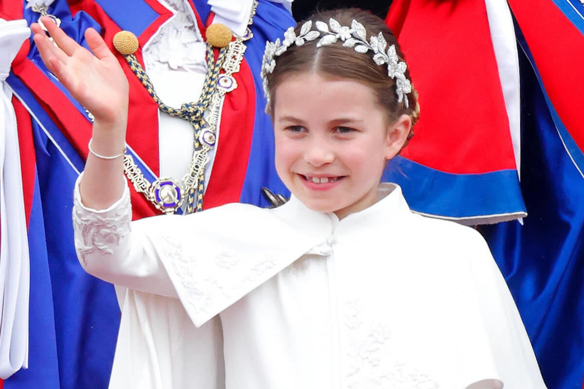 Princess Charlotte, who may not want to be 'burdened' with more royal titles as an adult, waves