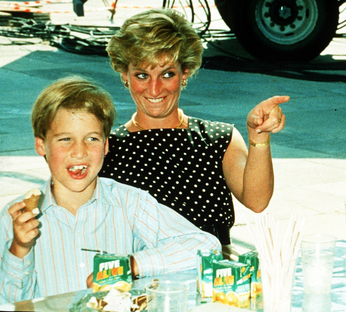 Princess Diana and Prince William laughing as they enjoy some refreshments at Windsor Great Park