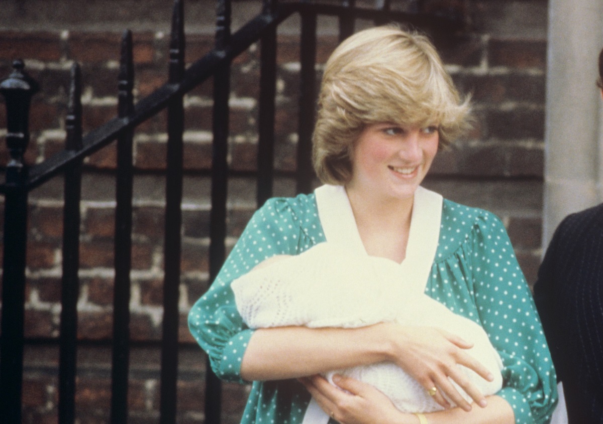 Princess Diana, who ripped up the royal rule book after she gave birth, holding newborn Prince William as she leaves St. Mary's hospital