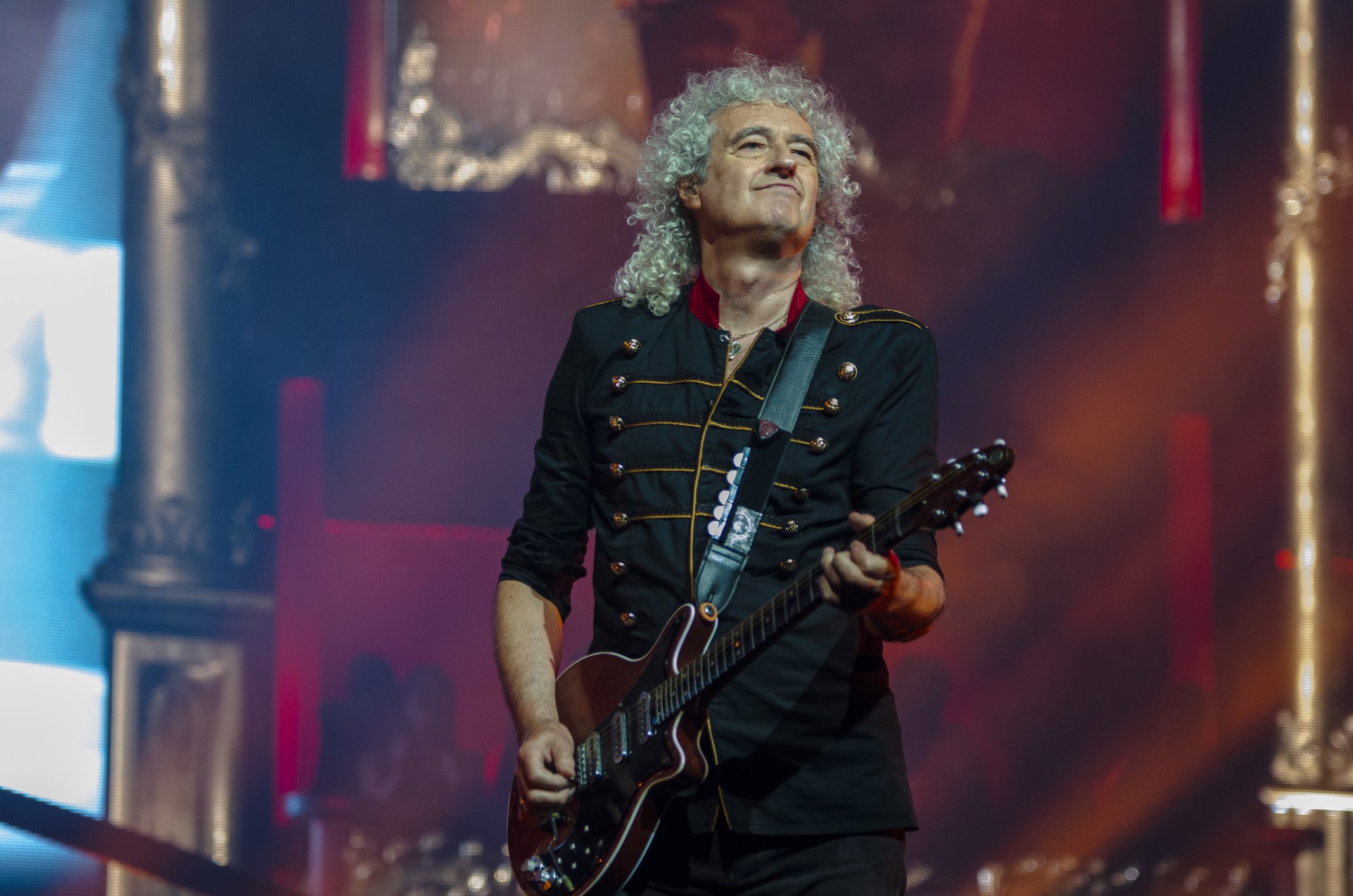 Brian May performs with Queen in France during their The Rapsody Tour