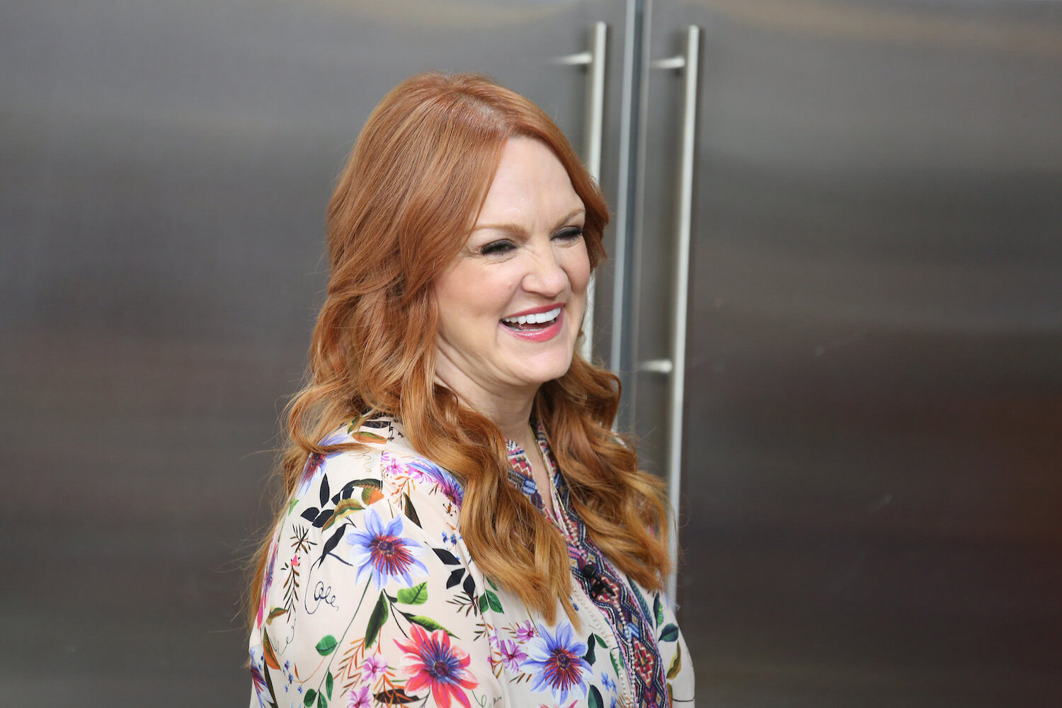'The Pioneer Woman' Ree Drummond laughing in a kitchen