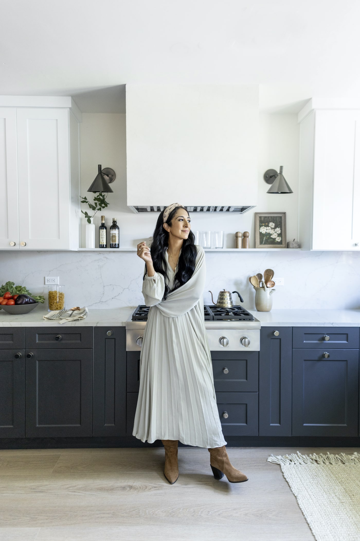 Veronica Valencia stands in a kitchen