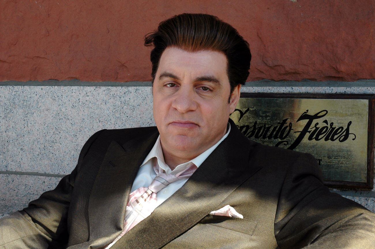 Steven Van Zandt sits on a fence in his costume for 'The Sopranos.'
