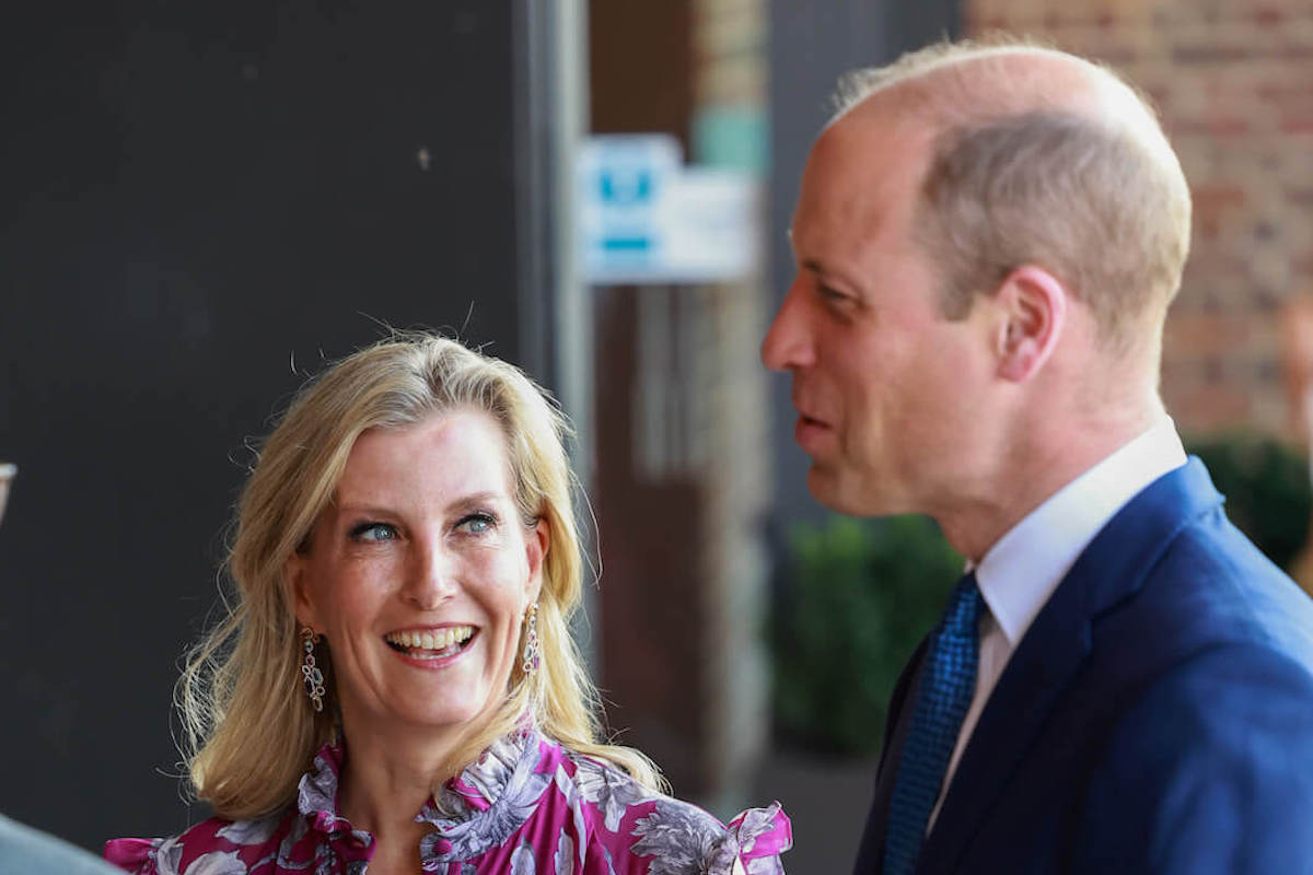 Sophie, Duchess of Edinburgh looks at Prince William, whom she exhibited a 'parent:child dynamic' with at a June 13 movie screening