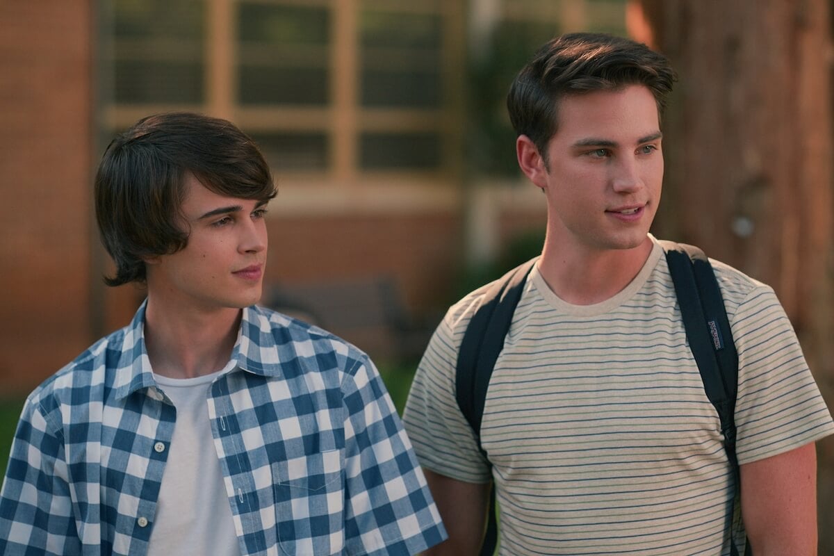 Logan Allen, in a checked shirt, and Carson Rowland, wearing a backpack, in "Sweet Magnolias' Season 3