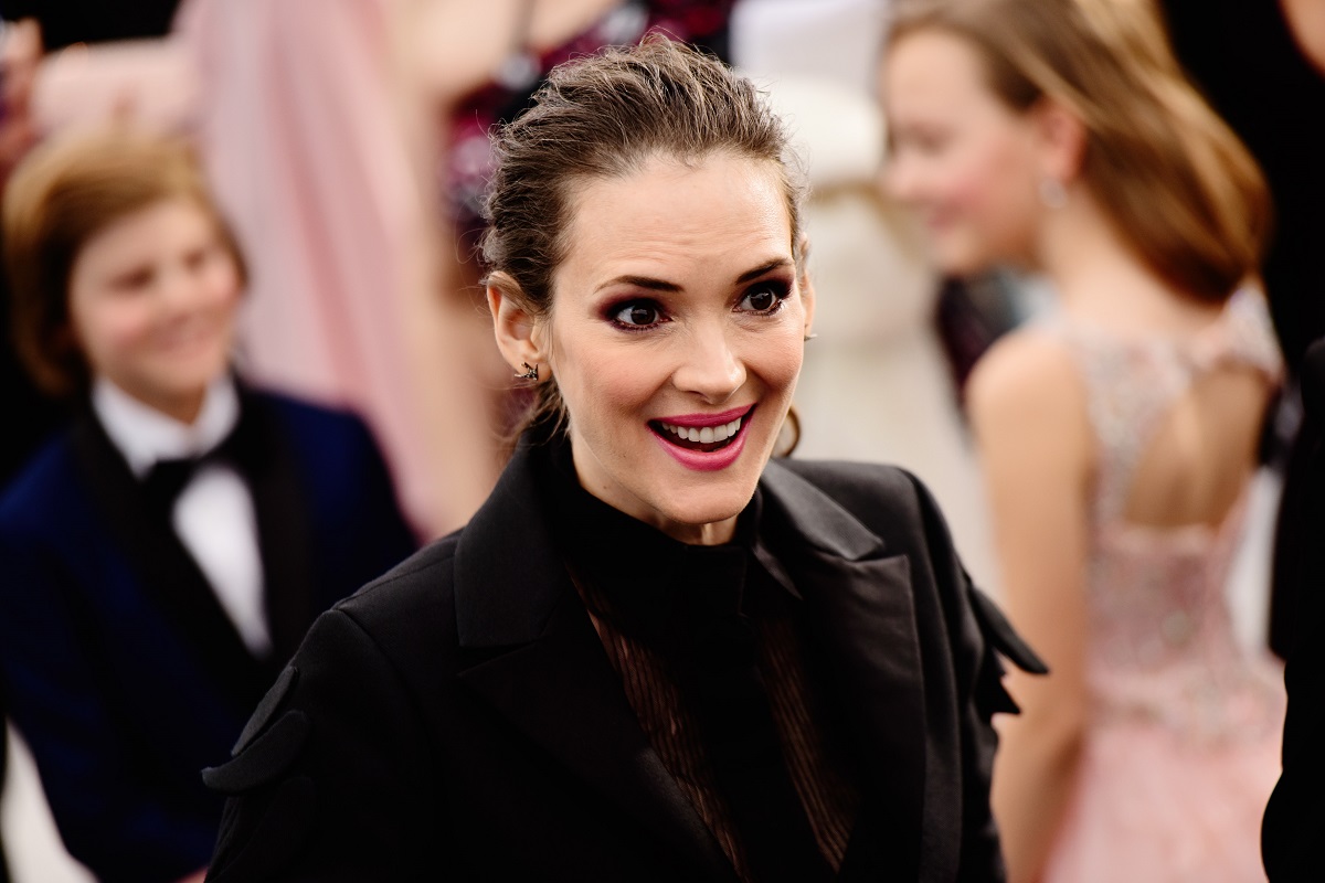 Winona Ryder wearing a black outfit while attending the Screen Actors Guild Awards.
