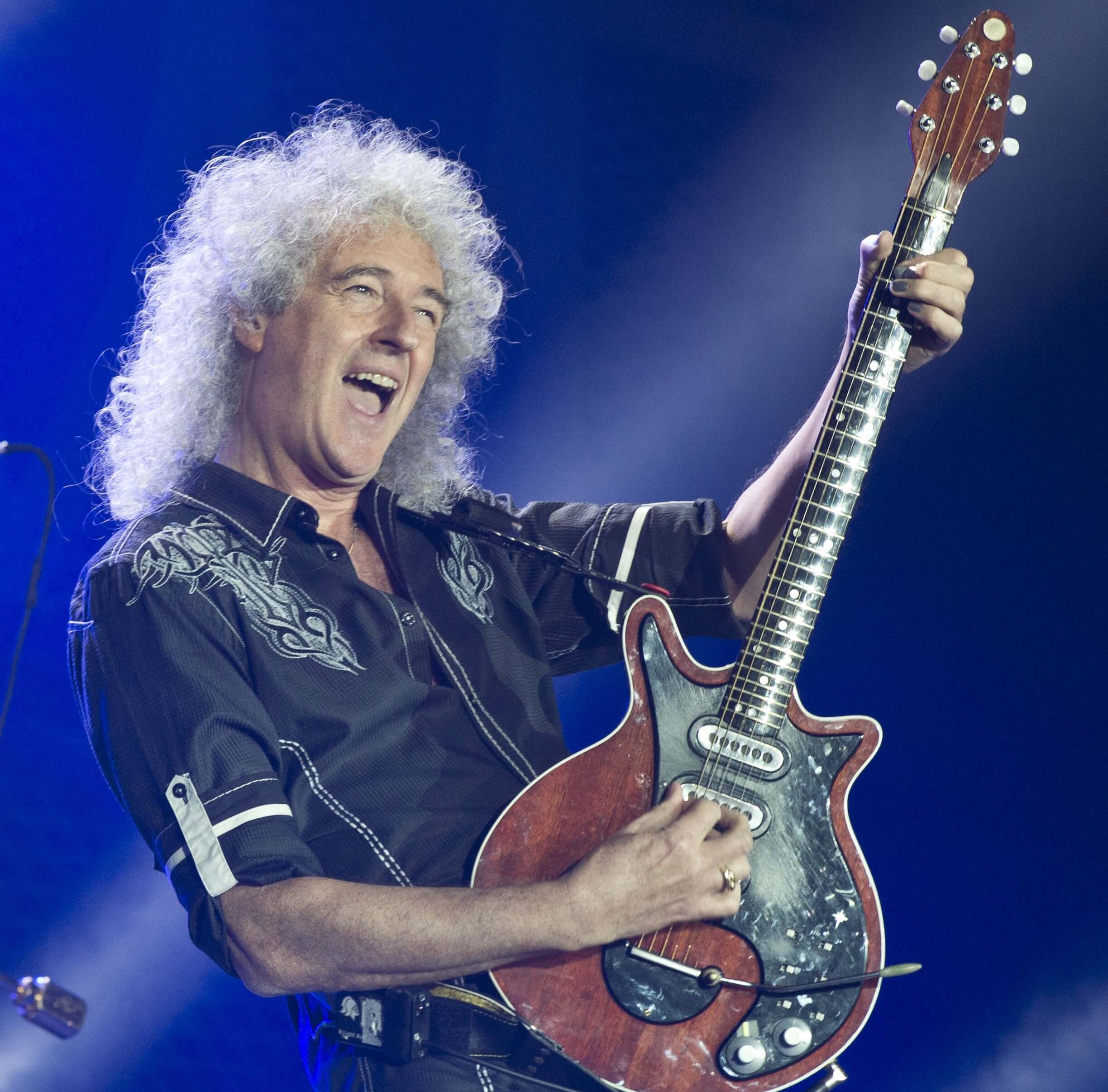 Brian May of Queen with a guitar