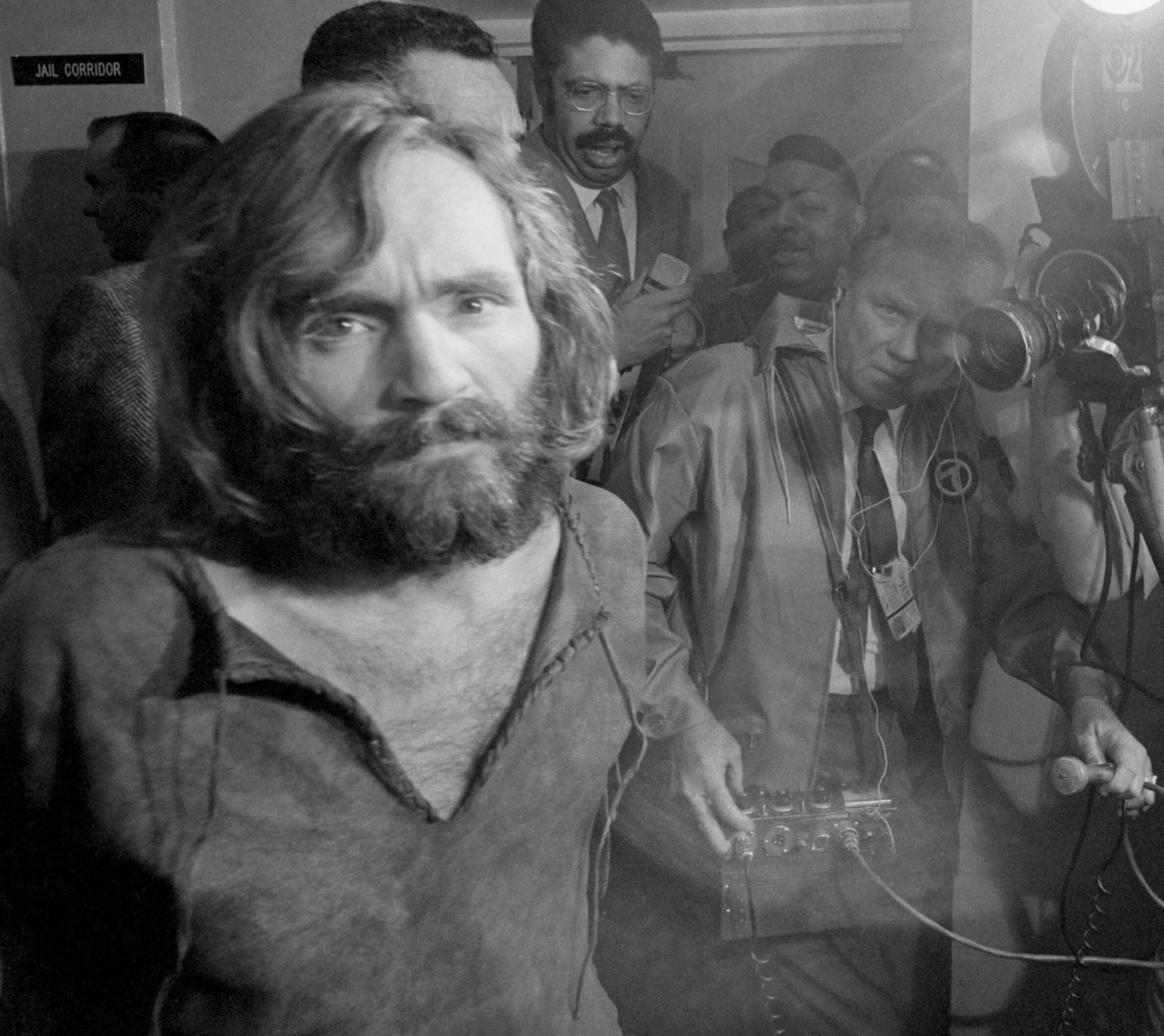 Charles Manson and a crowd