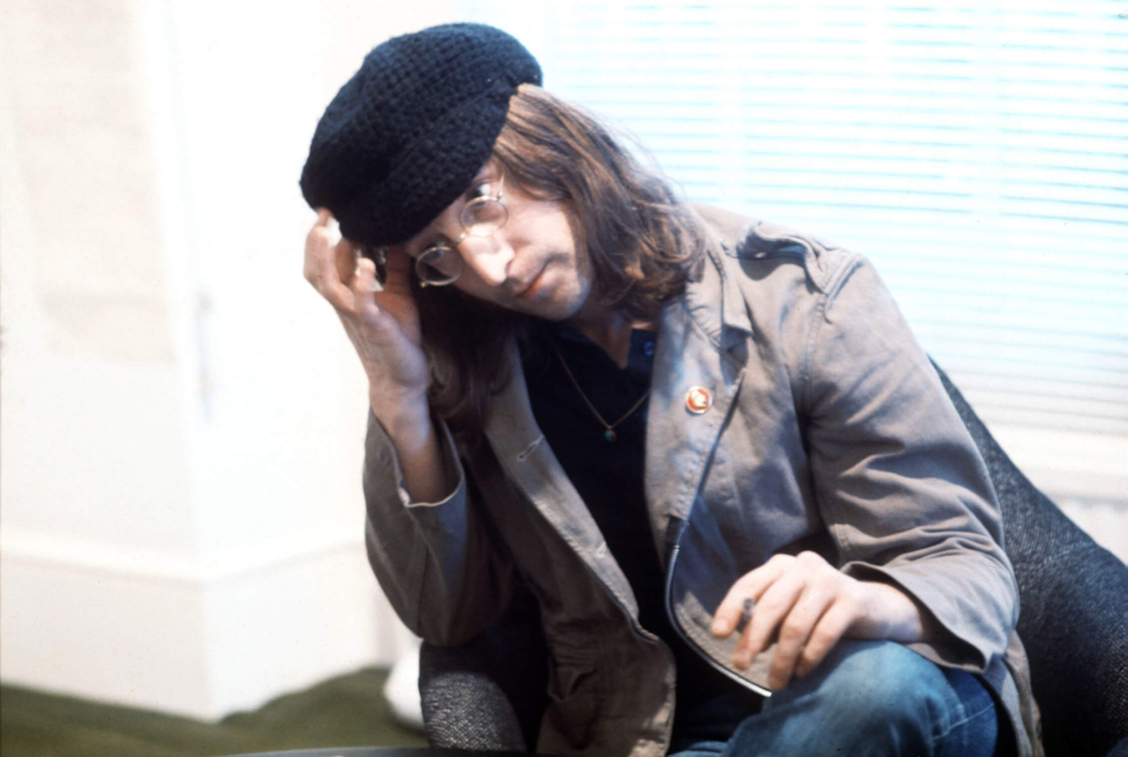 "Give peace a chance" singer John Lennon with a hat
