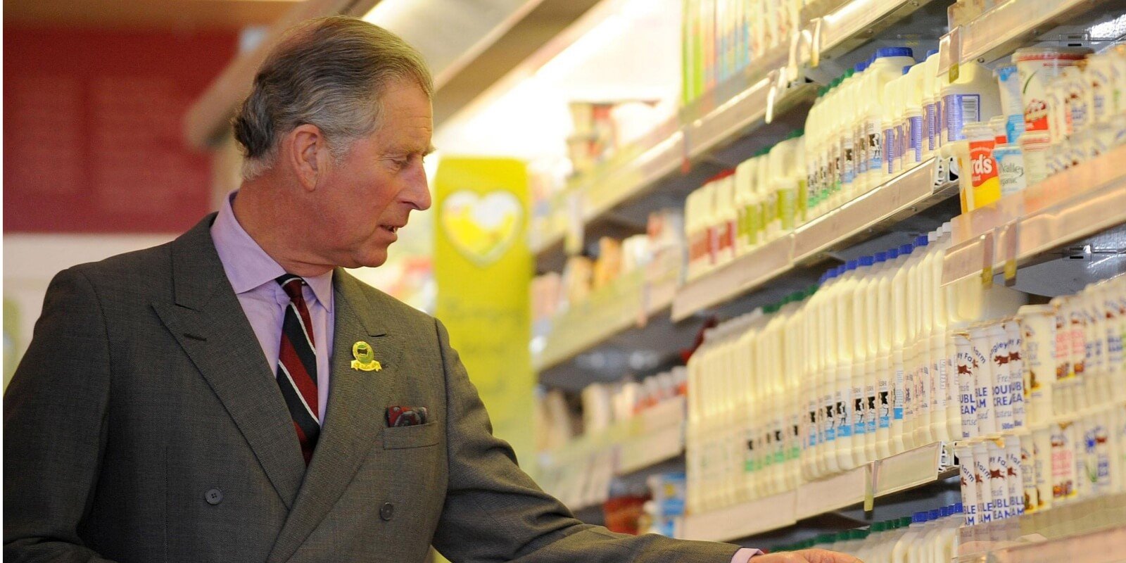 King Charles checks the local produce during a visit to Booths Supermarket on March 31, 2008 in Kendal, Cumbria, England.