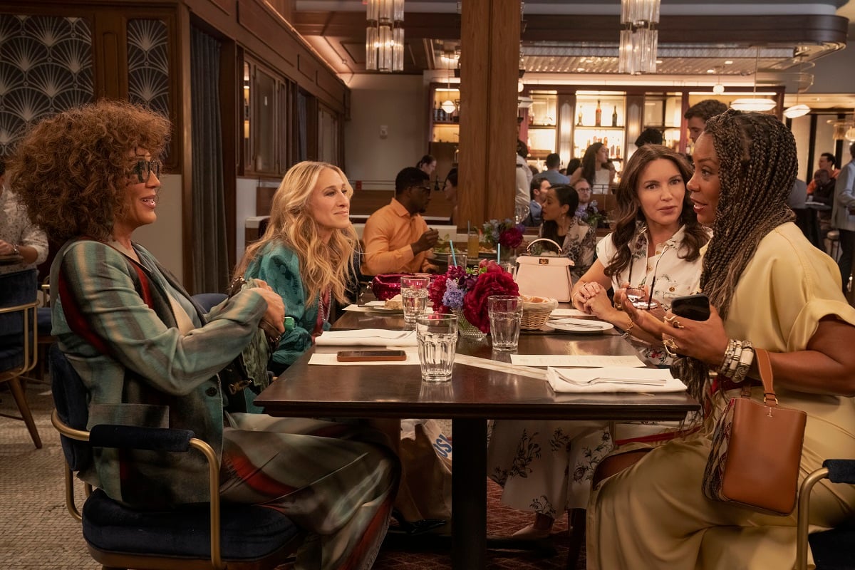 Nya Wallace, LTC, Carrie Bradshaw and Charlotte York sit at lunch during 'And Just Like That...' season 2 
