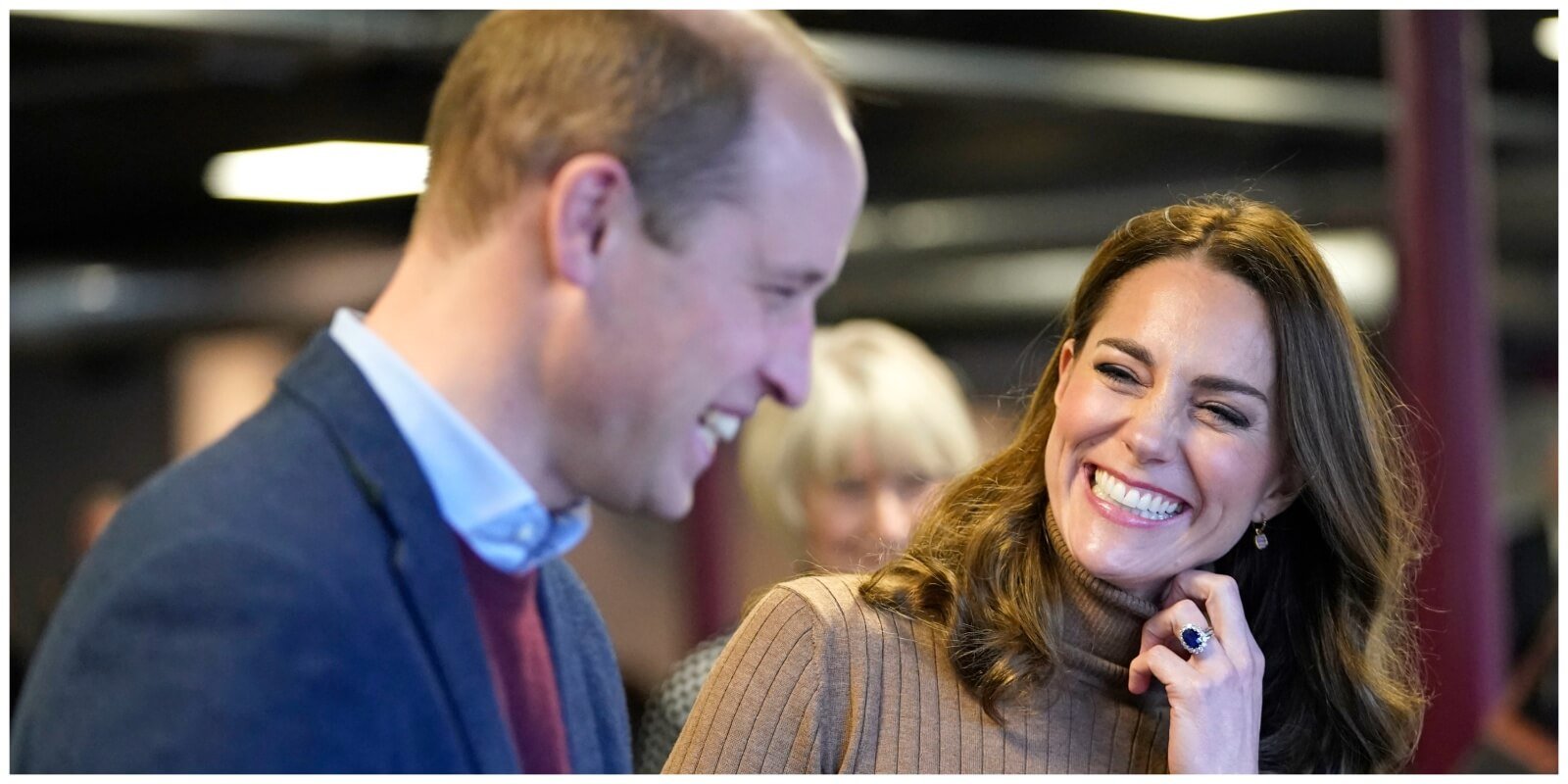 Prince William and Kate Middleton smile at a visit to the Church on the Street on January 20th, 2022 in Burnley, England.