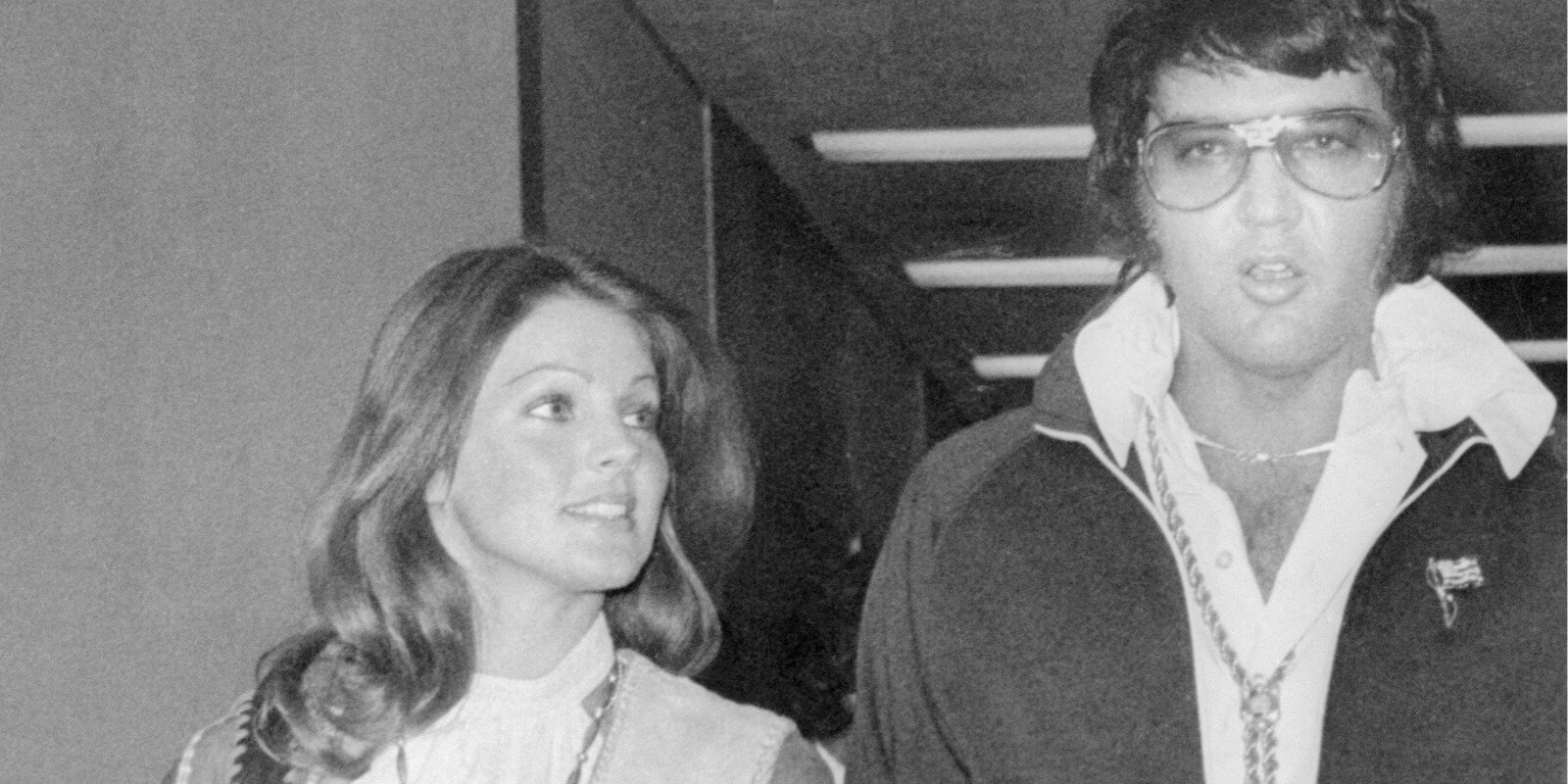 Priscilla Presley and Elvis Presley leave a Los Angeles courthouse the day their divorce was finalized.