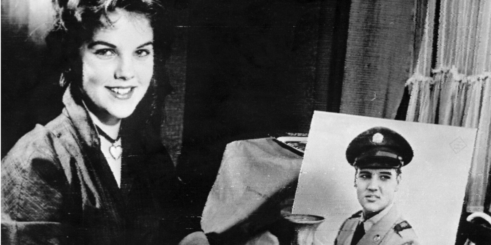 Priscilla Presley and a photo of Elvis Presley taken in 1960.
