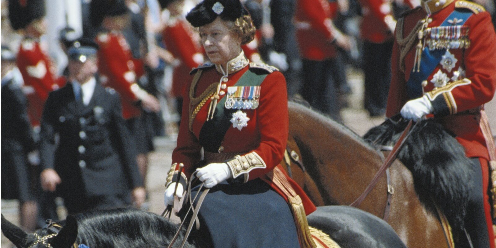Queen Elizabeth rides sidesaddle during the 1986 Trooping the Color parade.