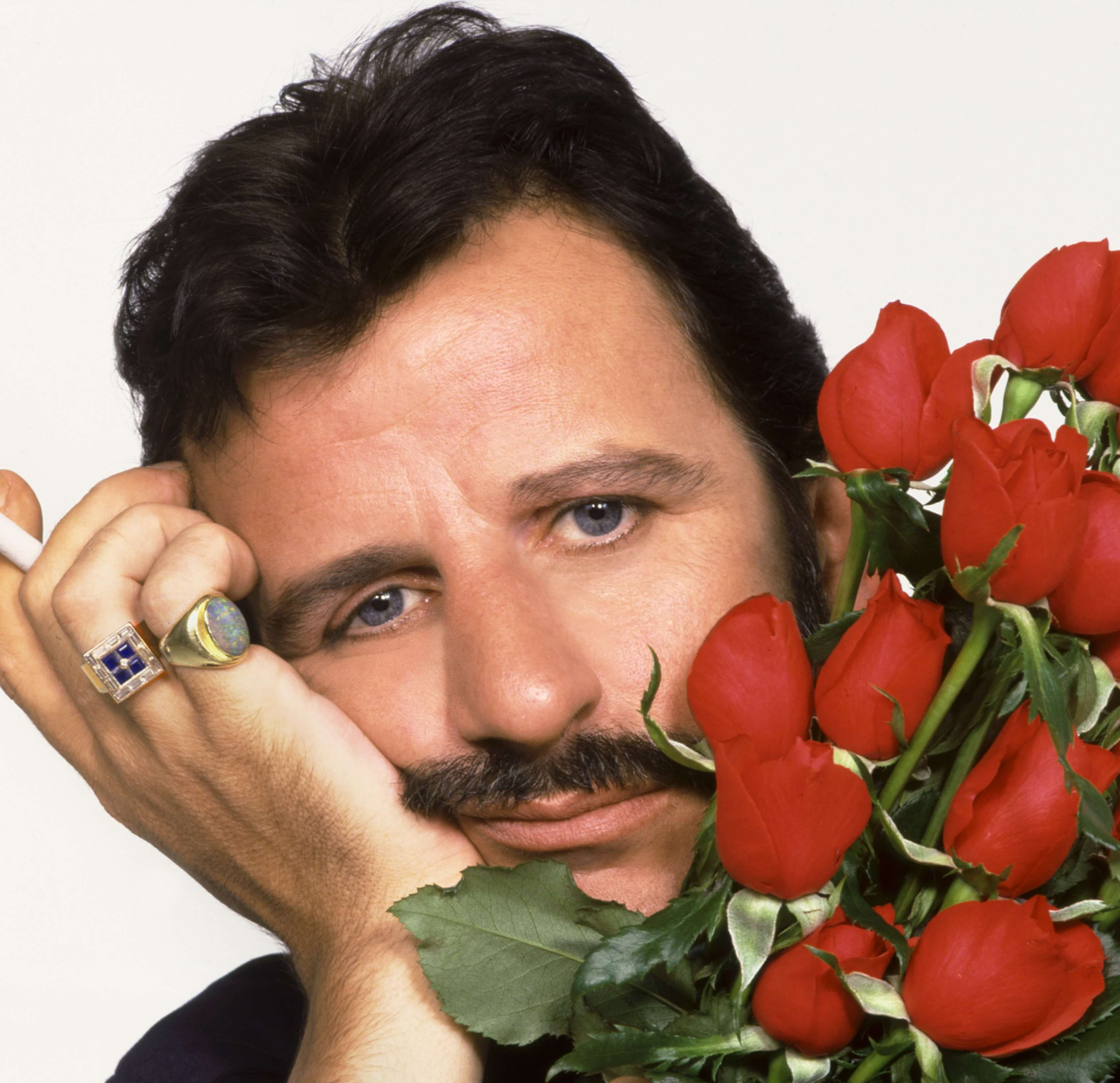"Back Off Boogaloo" singer Ringo Starr with roses