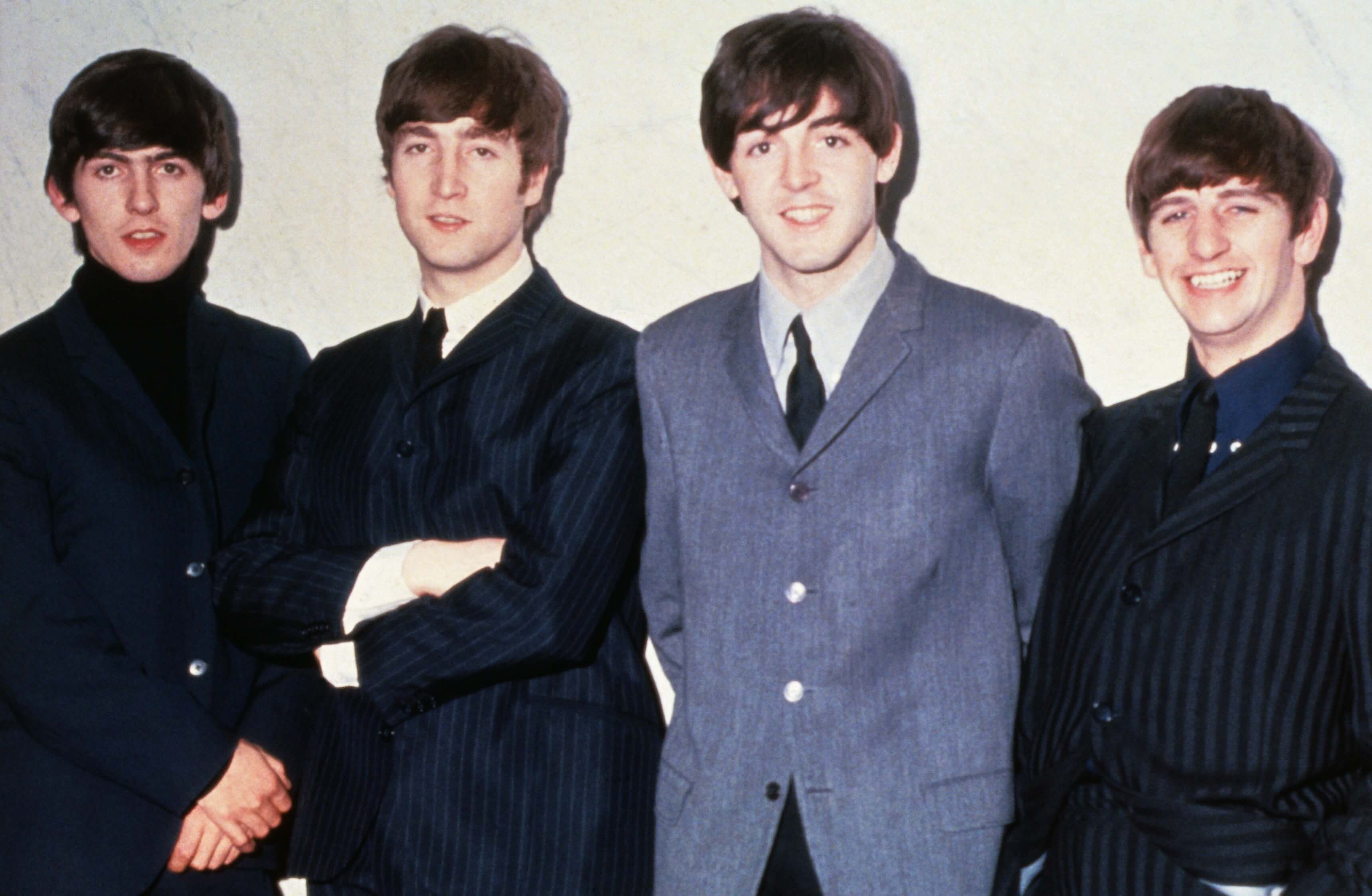 "I Want to Hold Your Hand" era Beatles in suits