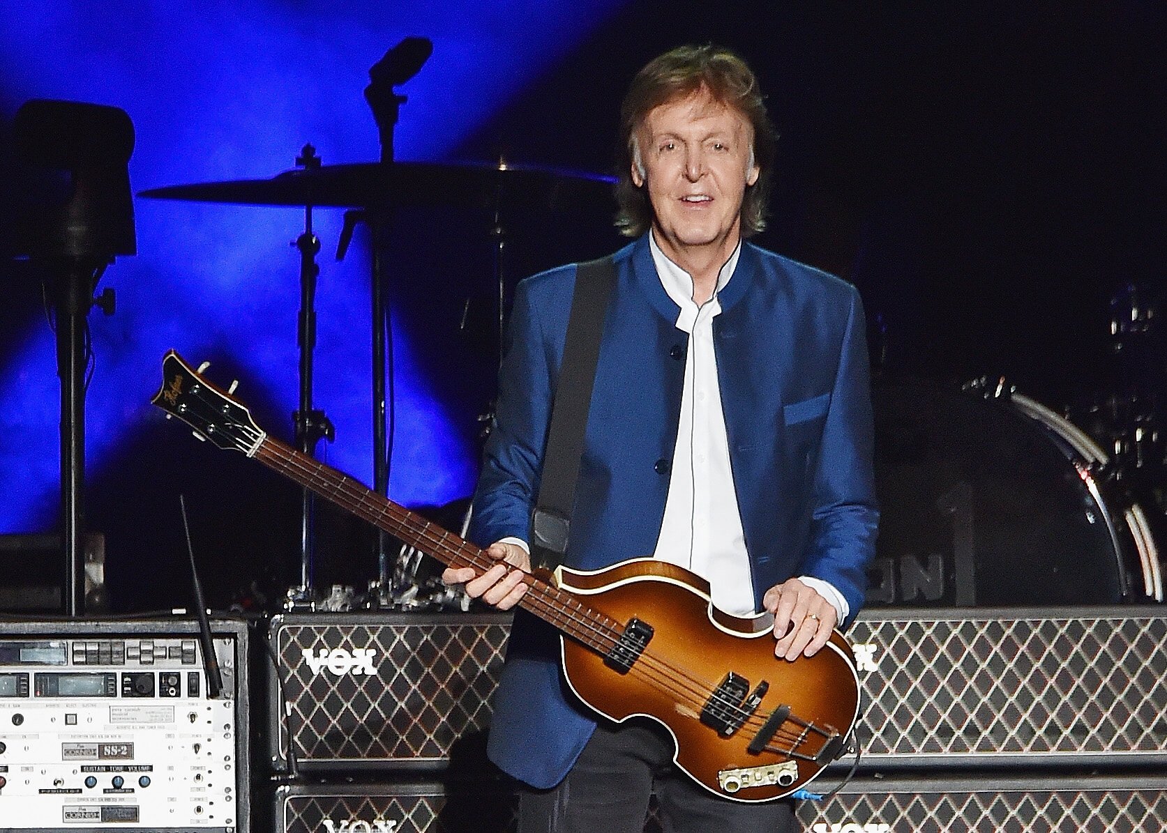 Paul McCartney, writer of The Beatles' "When I'm Sixty-Four," with a guitar