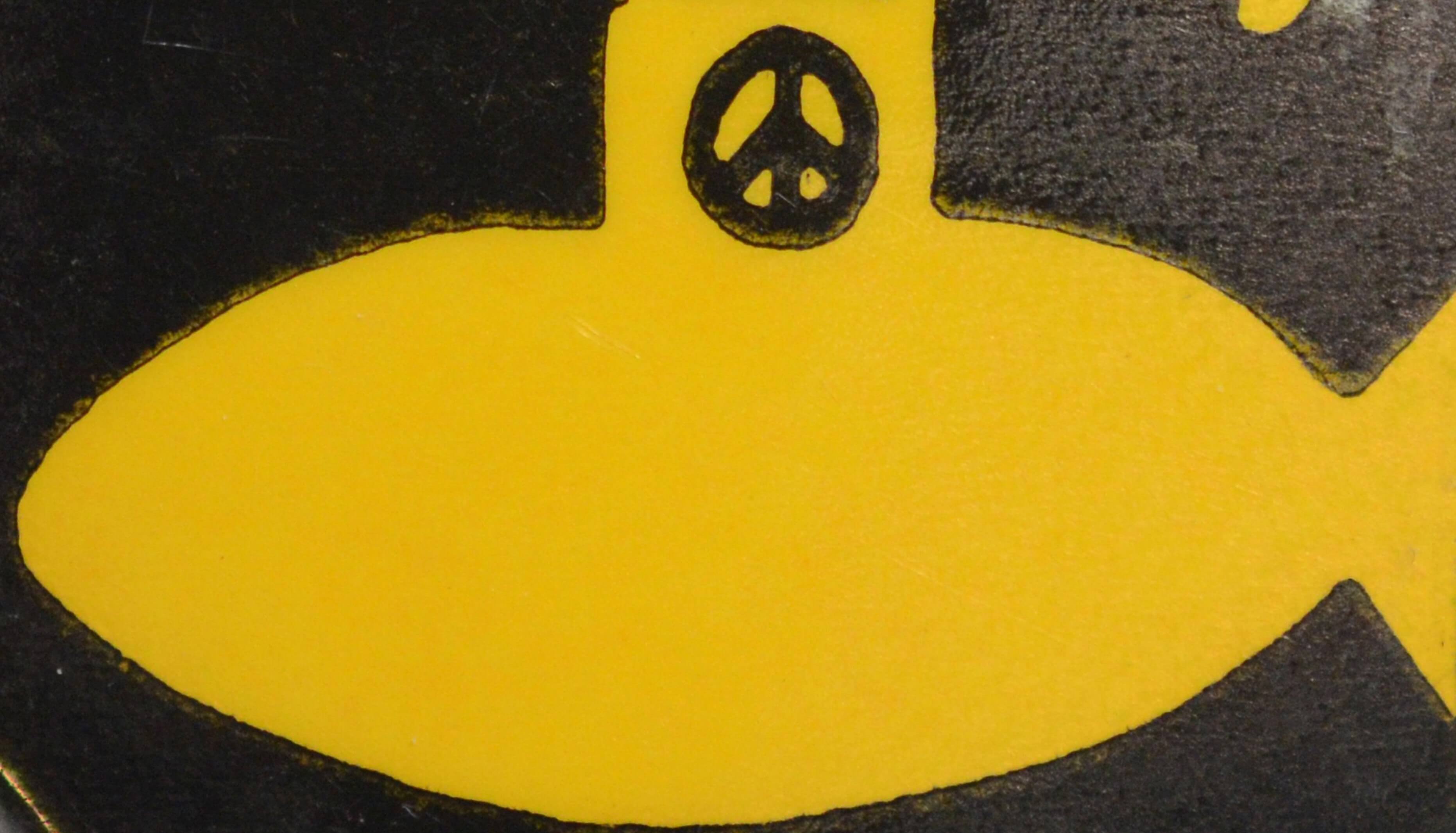 A button advertising The Beatles' "Yellow Submarine"
