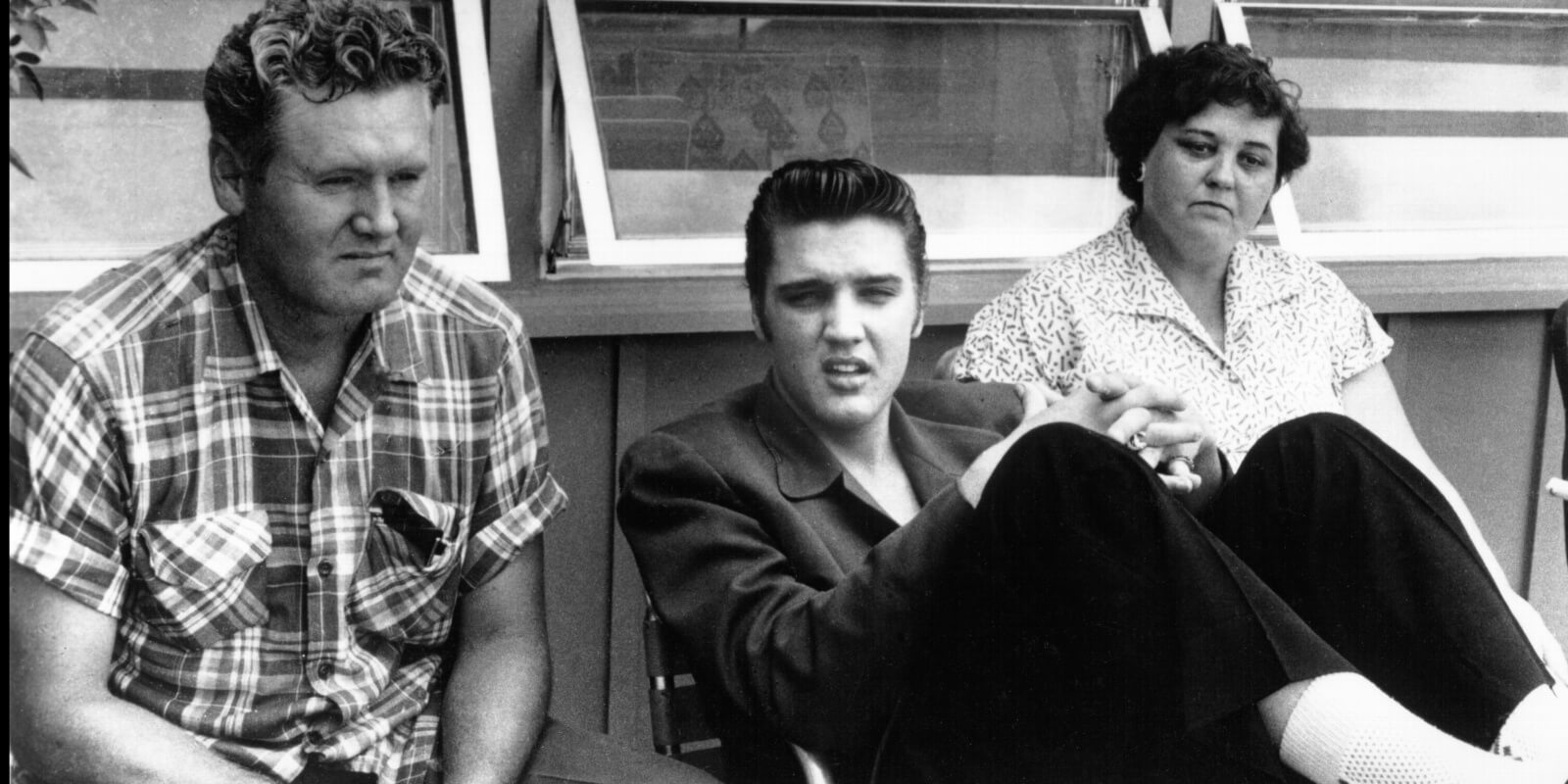 Vernon, Elvis, and Gladys Presley posed together in 1956.