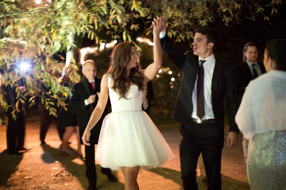 Alex Morgan and Servando Carrasco celebrate at their wedding reception at Rancho Dos Pueblos in Santa Barbara, California
