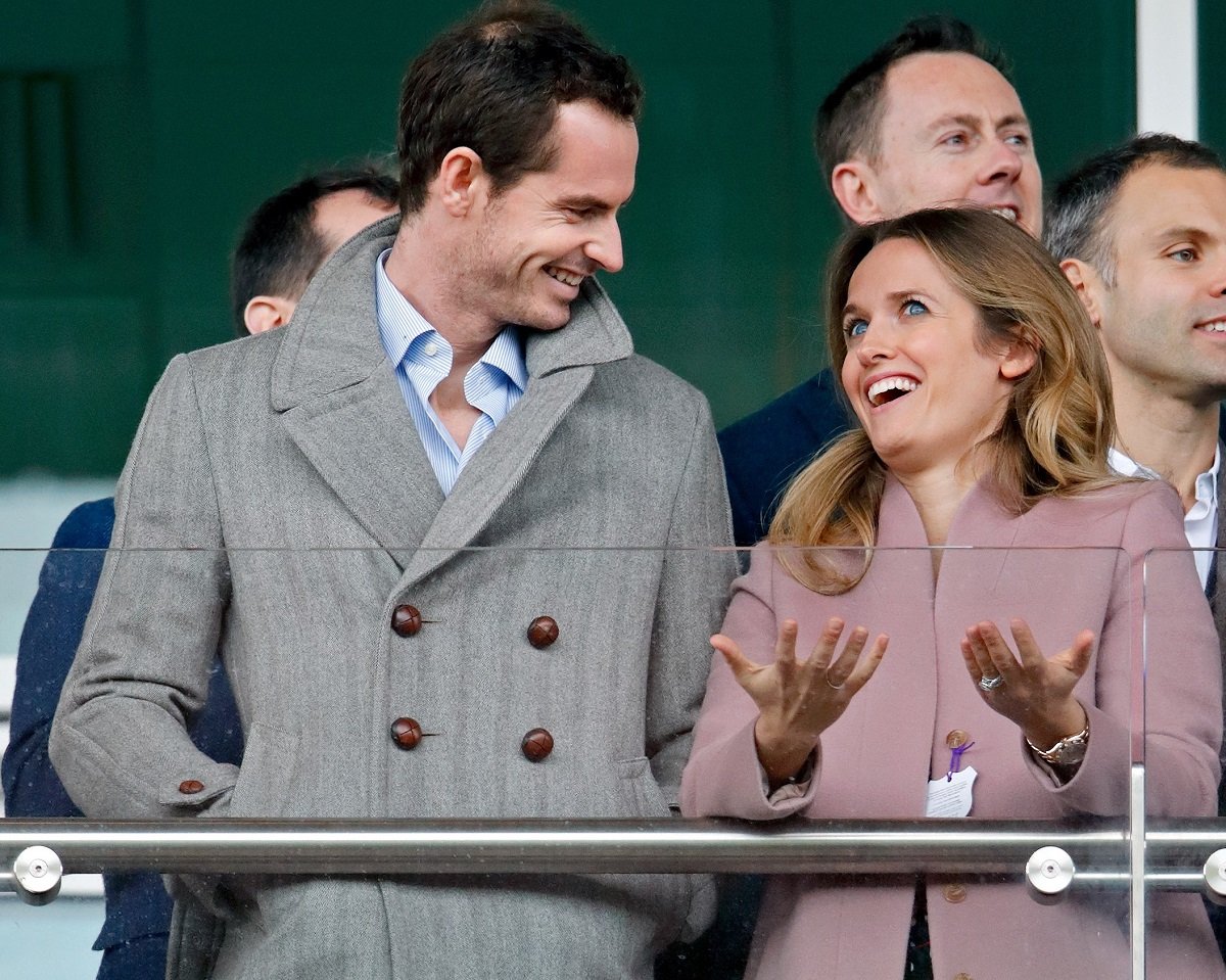 Andy Murray, who pays tribute to his wife Kim during matches by tying his wedding ring to his shoelaces, attends day 2 'Ladies Day' of the Cheltenham Festival in England