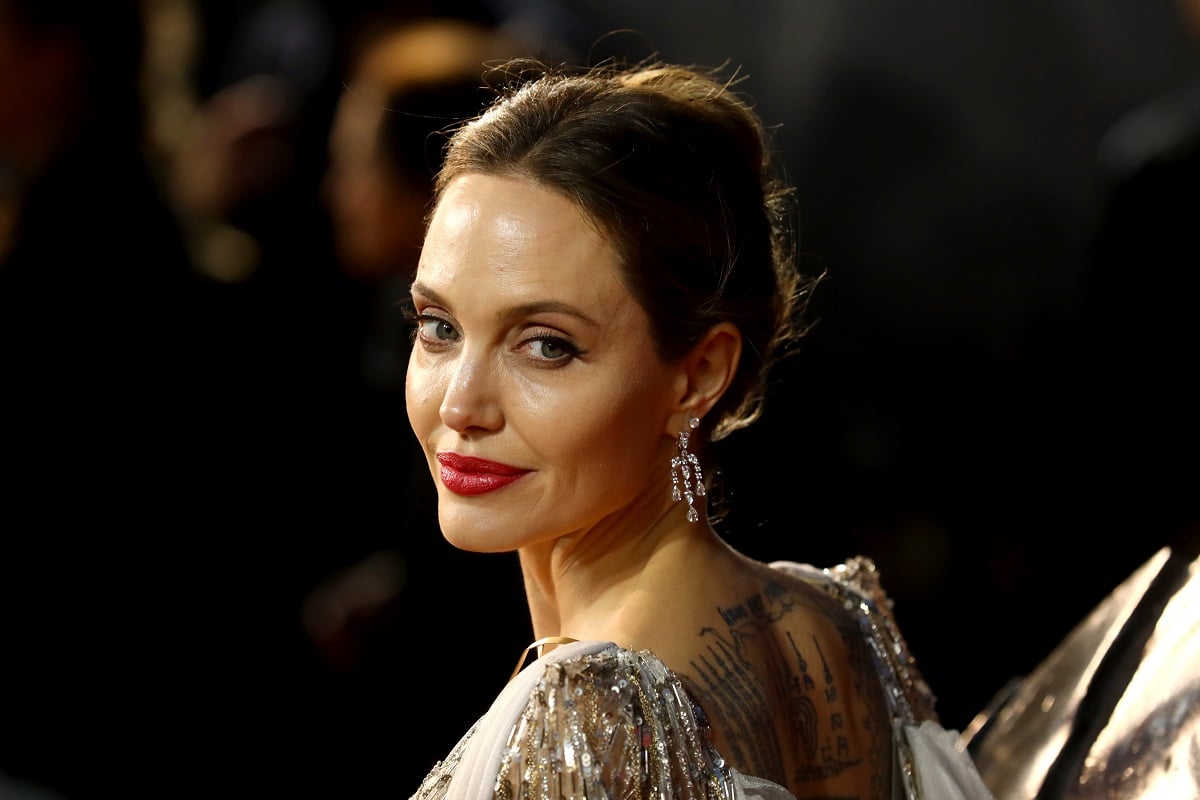 Angelina Jolie posing for a picture at the premiere of 'Maleficent: Mistress Of Evil'.