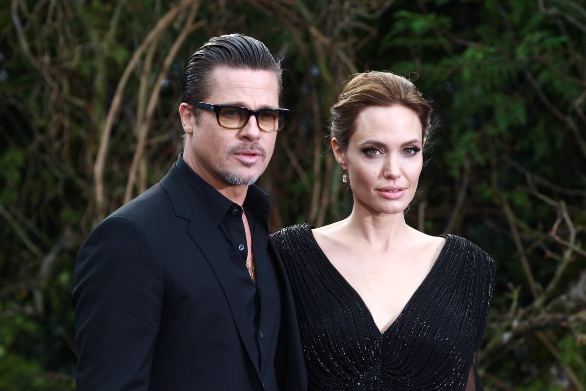 Brad Pitt and Angelina Jolie attend a private reception as costumes and props from Disney's "Maleficent" are exhibited in support of Great Ormond Street Hospital at Kensington Palace on May 8, 2014 in London, England