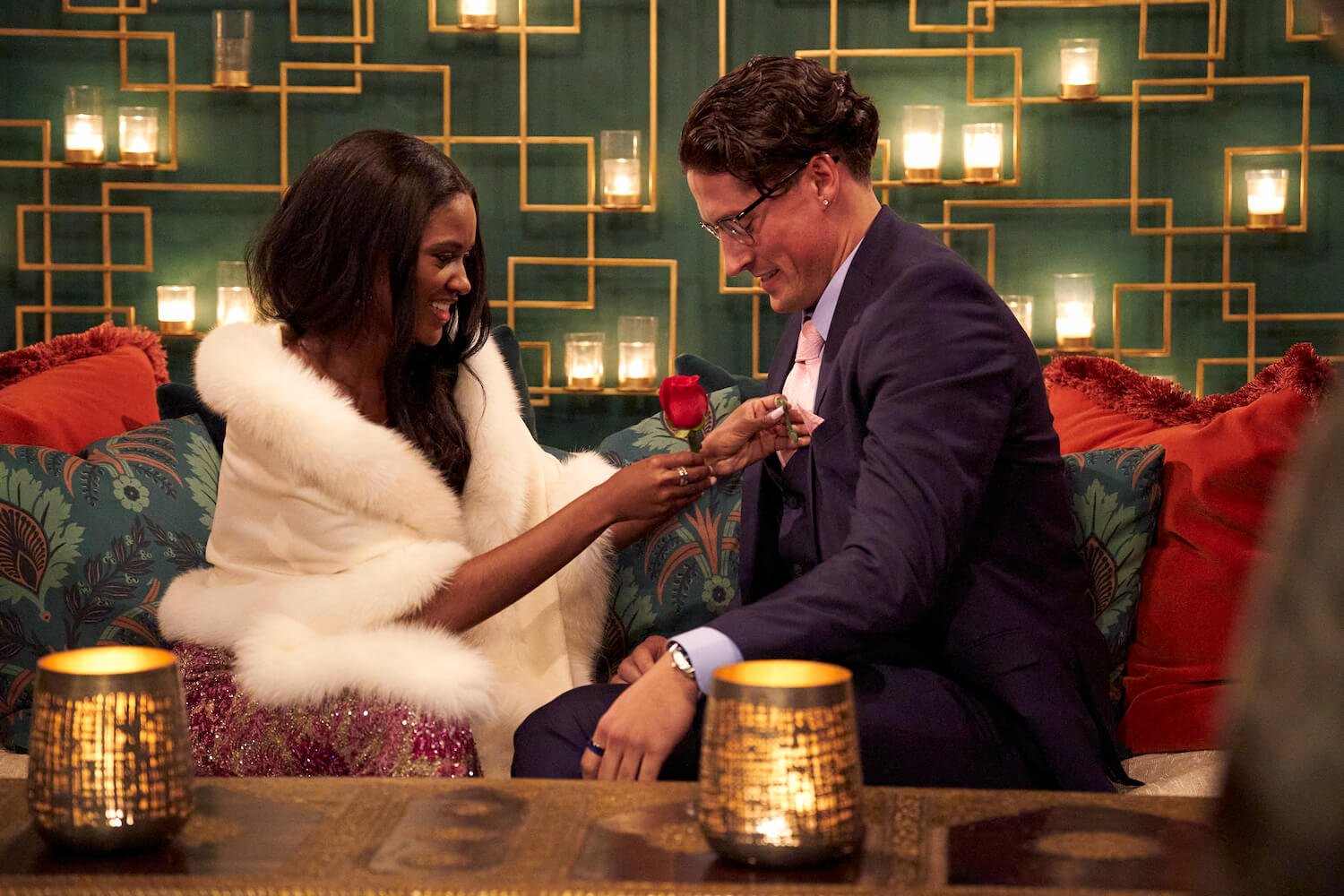 Charity Lawson clipping a rose on to Brayden Bowers' suit in 'The Bachelorette' 2023