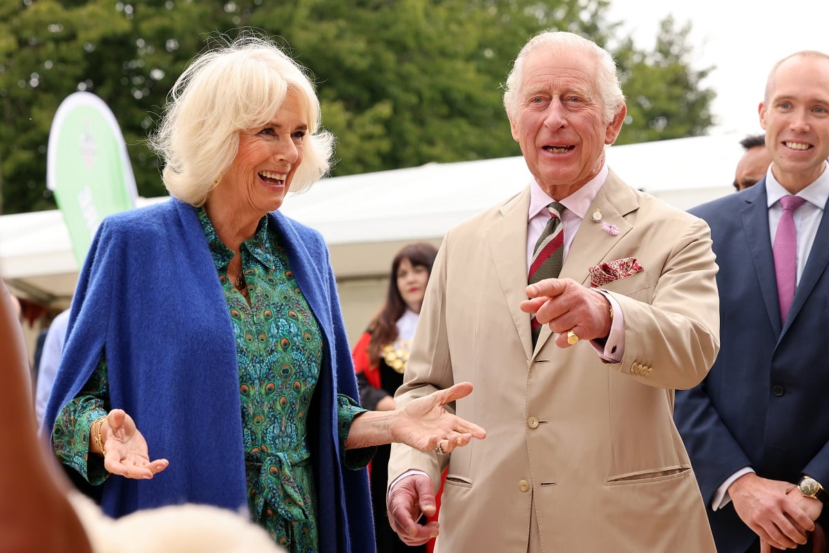 Camilla Parker Bowles and King Charles III, who a body language expert says no longer displays this behavior and gestures around his wife, during Brecknock Agricultural Society’s annual show