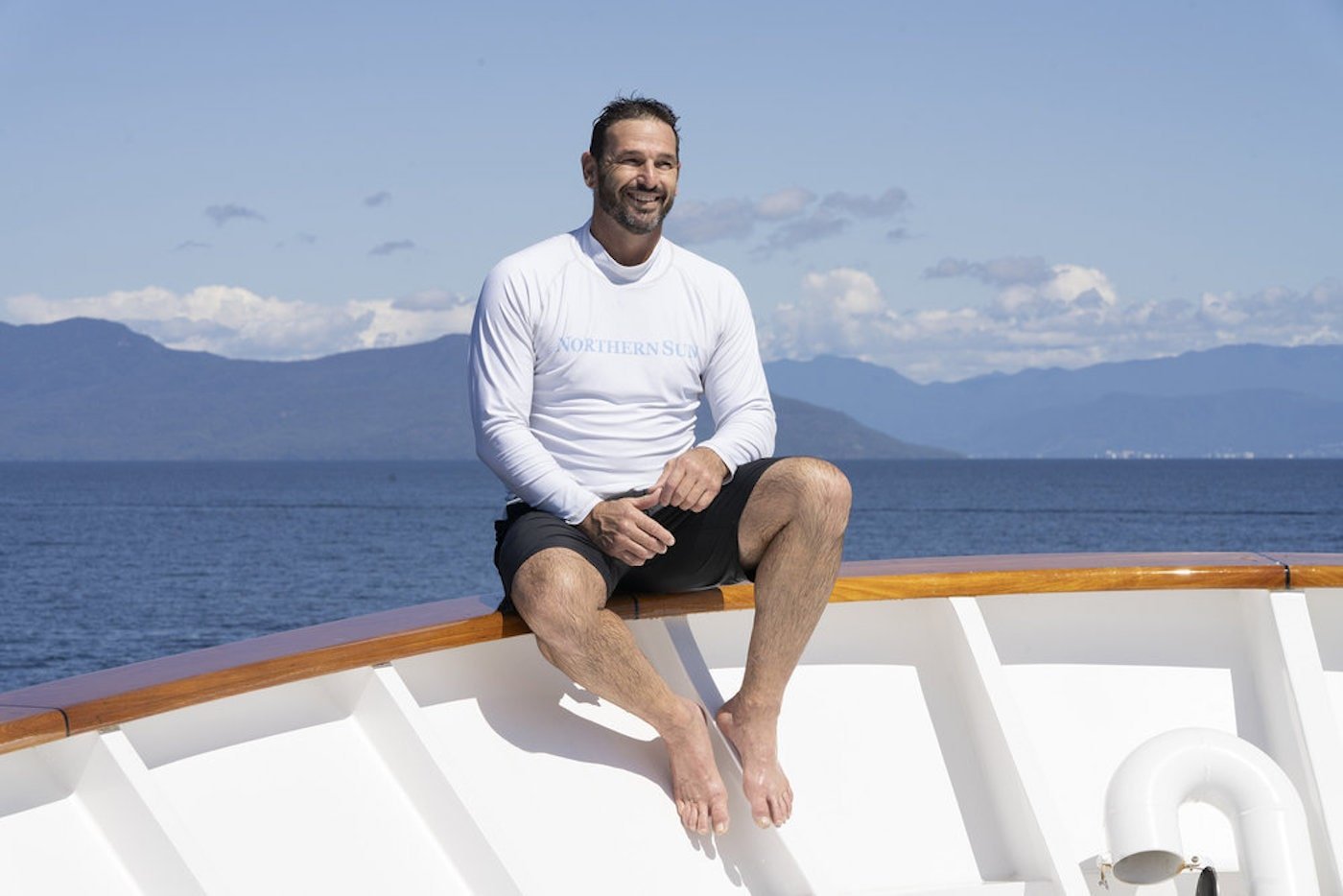 Captain Jason Chambers sits on the bow of the boat on 'Below Deck Down Under'