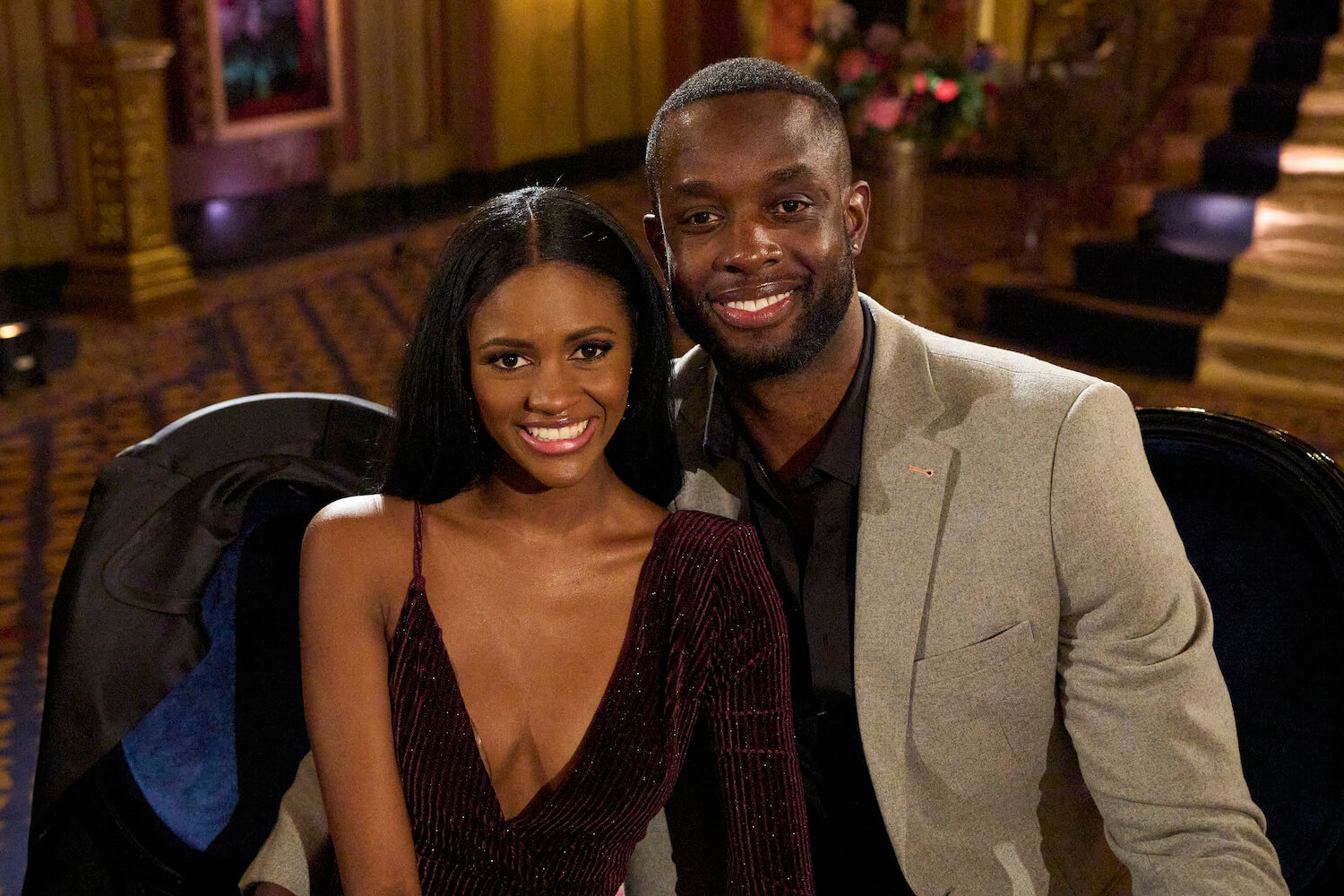 Charity Lawson and Aaron Bryant from 'The Bachelorette' 2023 sitting next to each other and smiling