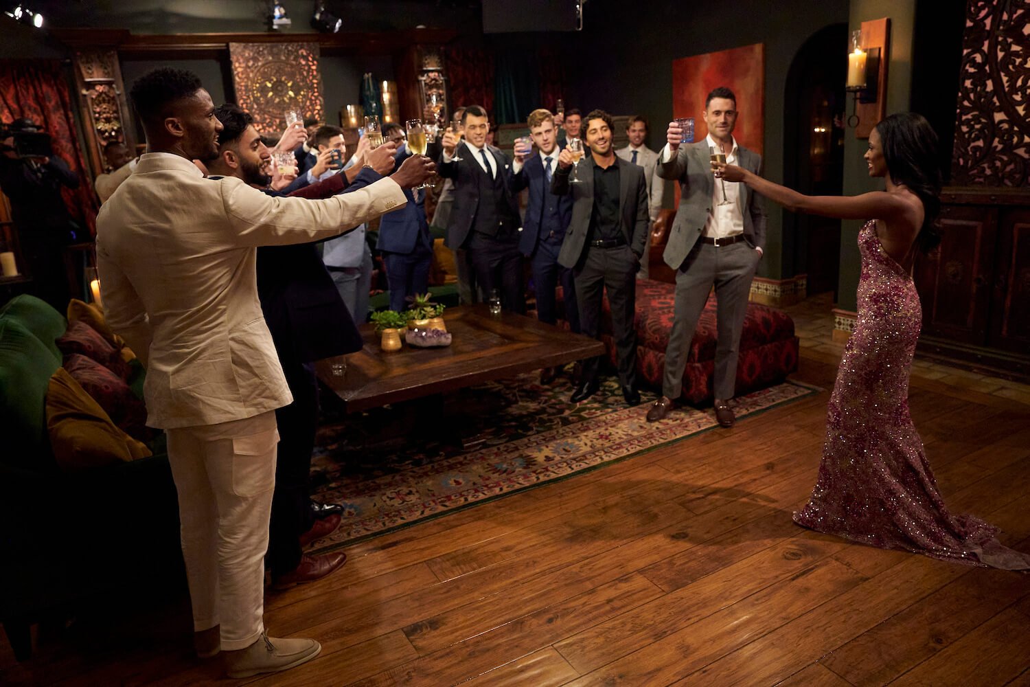 Charity Lawson toasting to the men during 'The Bachelorette' 2023 premiere