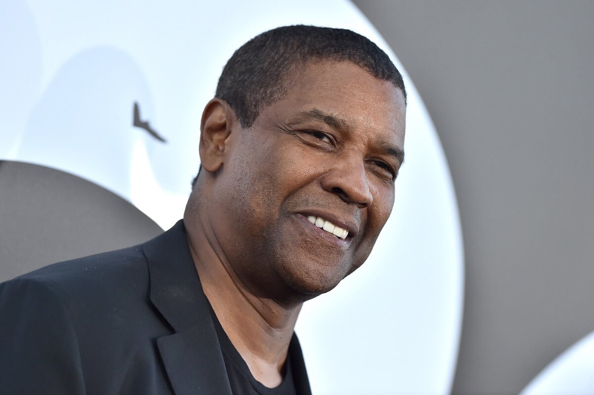 Denzel Washington posing in a suit at the premiere of Columbia Picture's 'The Equalizer 2'.