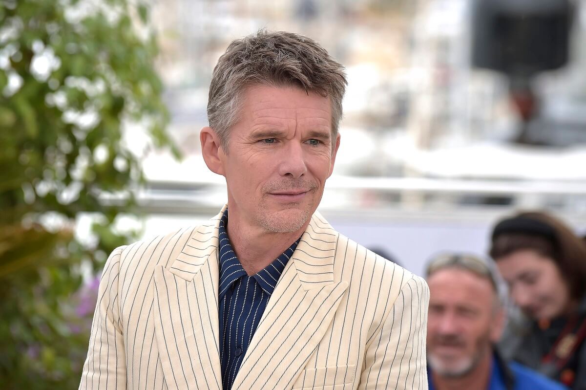 Ethan Hawke posing in a suit at a photocall for the film Strange Way Of Life