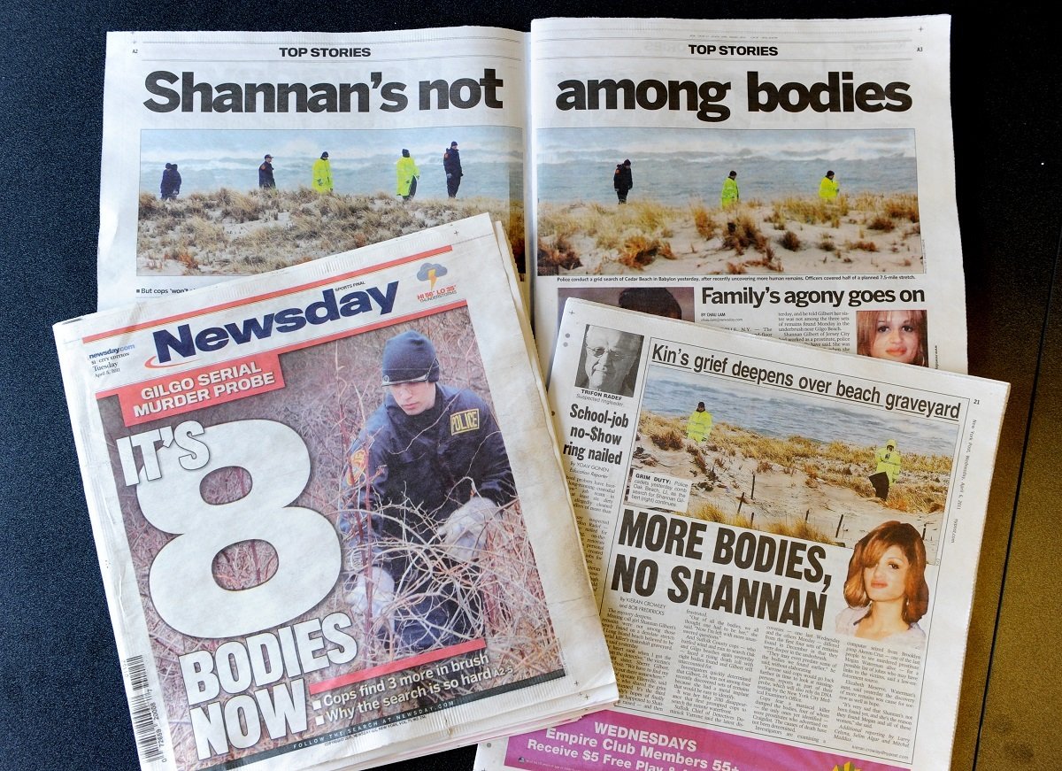 Newspaper clippings about the discovery of bodies close to Gilgo Beach on Long Island, New York