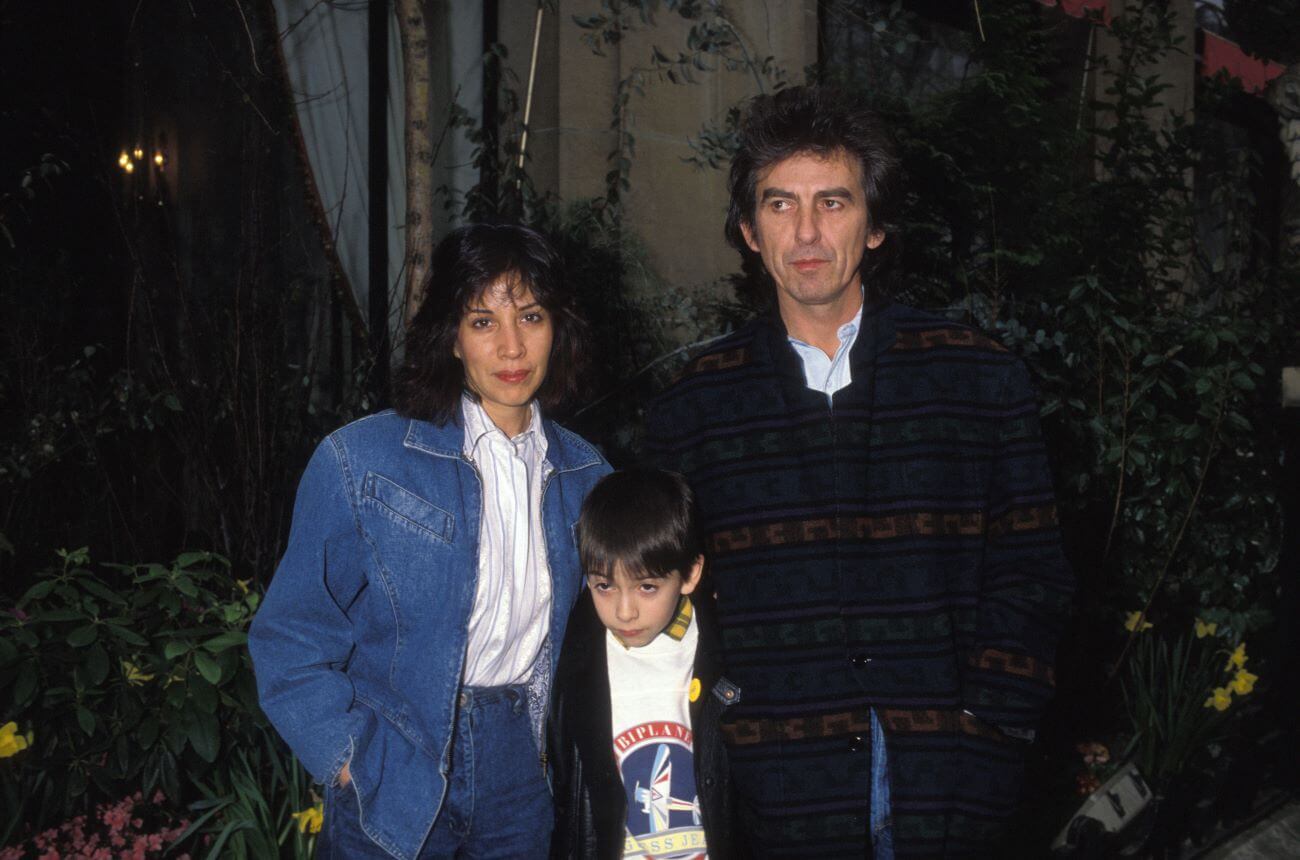 Dhani Harrison stands in between his parents, George and Olivia Harrison.