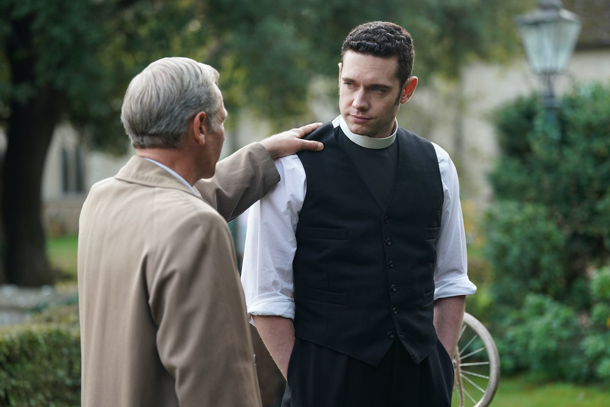 Geordie (Robson Green) with his hand on Will's (Tom Brittney) shoulder in 'Grantchester' Season 8