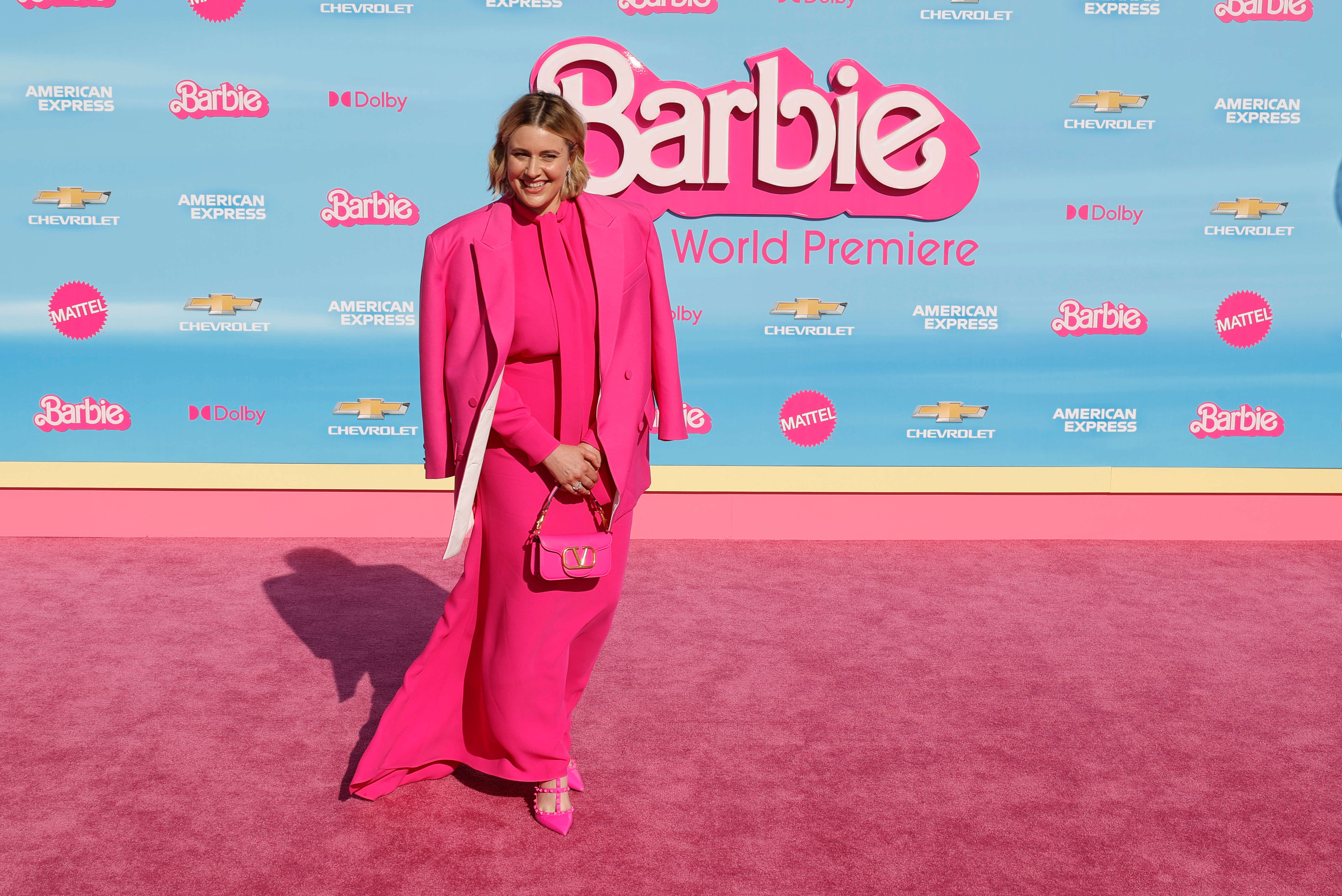 Greta Gerwig on the pink carpet for 'Barbie,' in all-pink.