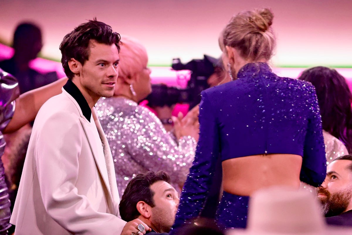 Harry Styles and Taylor Swift speak during the 65th GRAMMY Awards