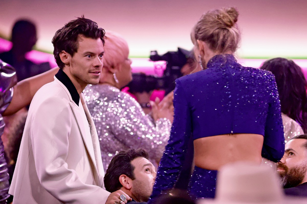 Harry Styles and Taylor Swift speak during the 65th GRAMMY Awards