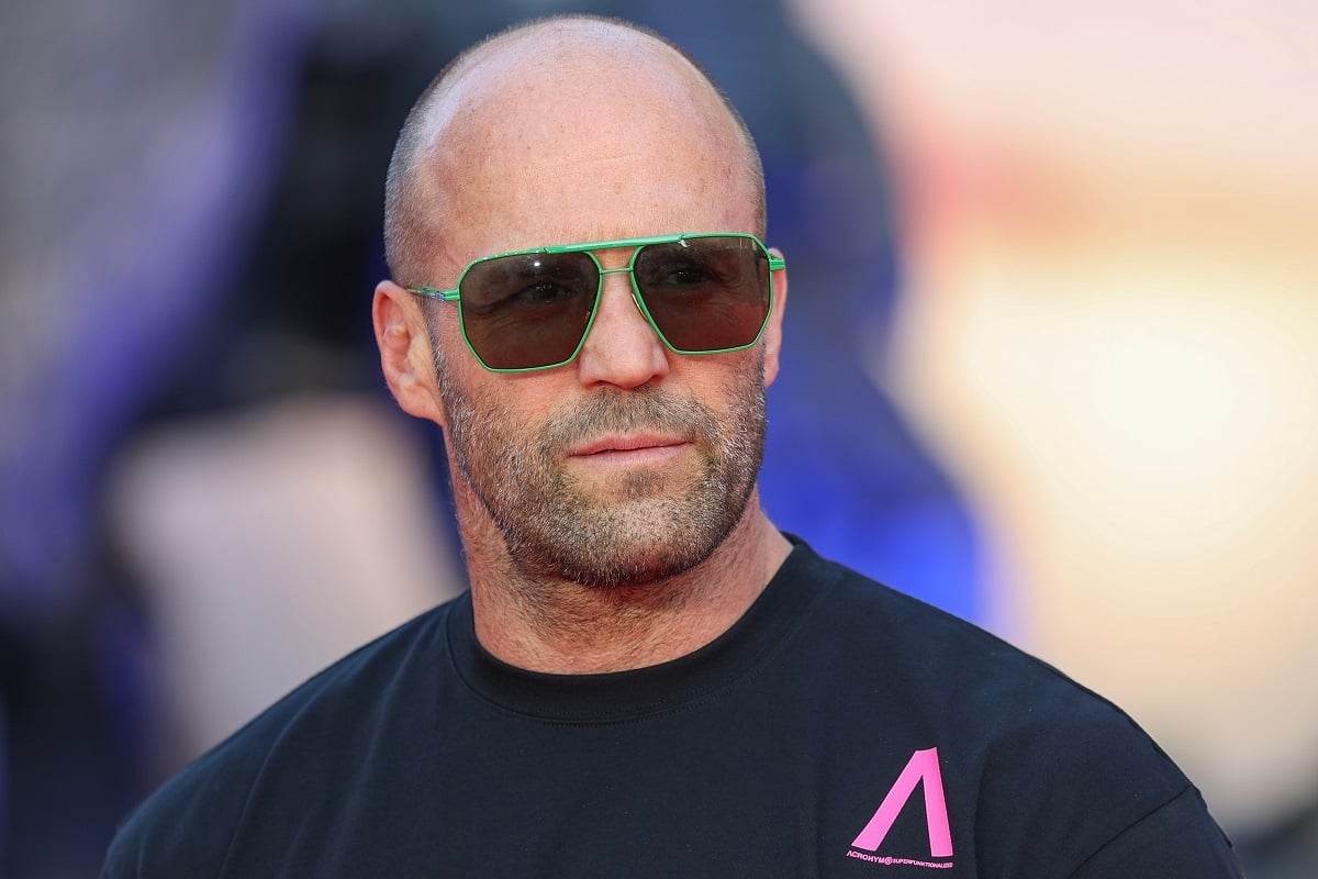 Jason Statham taking a picture in sunglasses at the 'Transformers: Rise Of The Beasts' premiere
