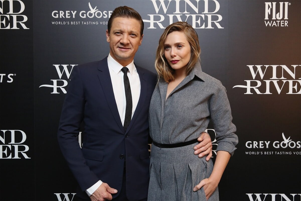 Jeremy Renner hugging Elizabeth Olsen at the premiere of 'Wind River'.