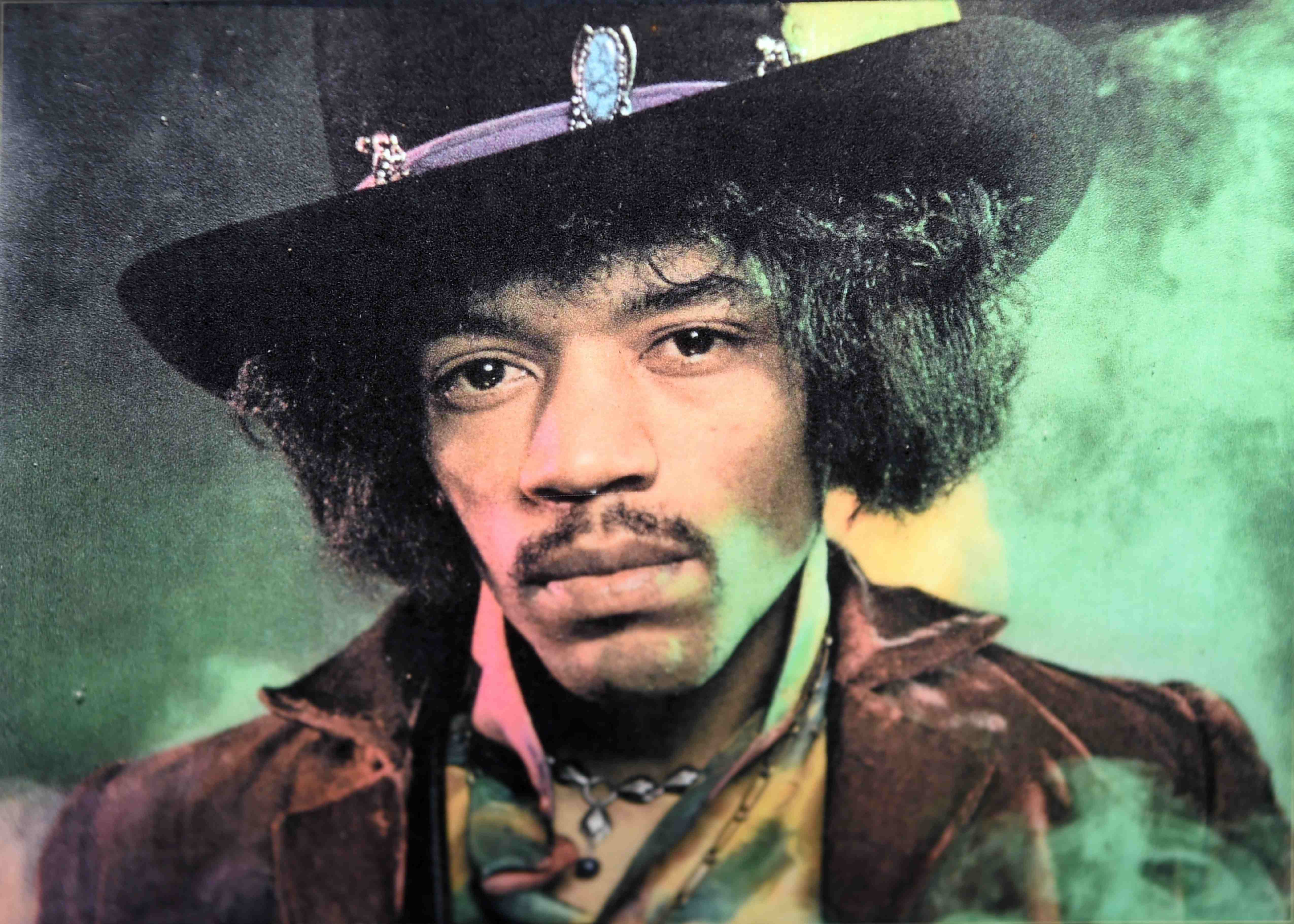 Jimi Hendrix close-up in a hat.