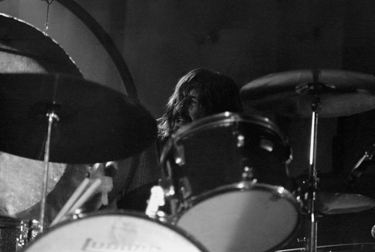 Led Zeppelin's John Bonham sits behind his drum kit during a 1972 concert in Wales.