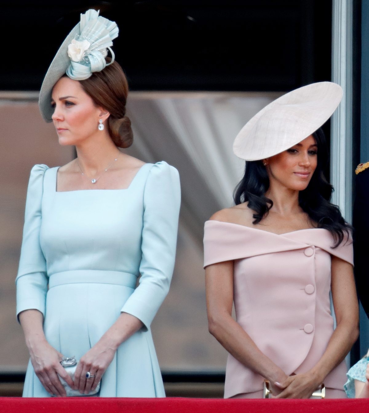 Kate Middleton and Meghan Markle standing on the balcony of Buckingham Palace during Trooping The Colour 2018