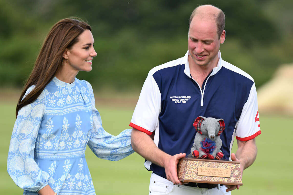 Kate Middleton and Prince William at a July 6 polo match where they were 'relaxed' and engaging in PDA