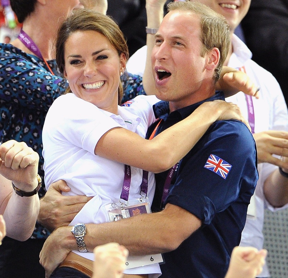 Kate Middleton and Prince William hugging each other and cheering during Day 6 of the London Olympic Games