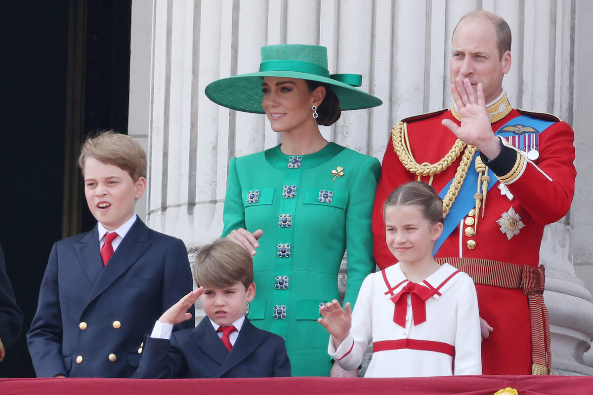 Kate Middleton and Prince William, who got a 'first' with Adelaide Cottage, stand with their children